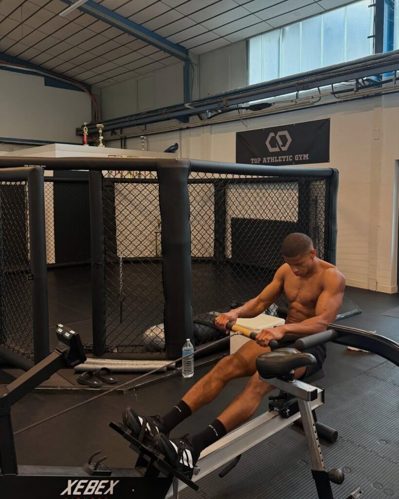 male model working out in gym routine