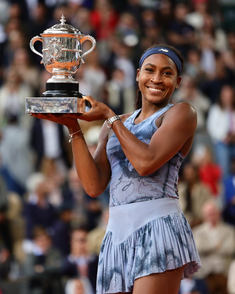 Coco Gauff holding her Roland Garros trophy